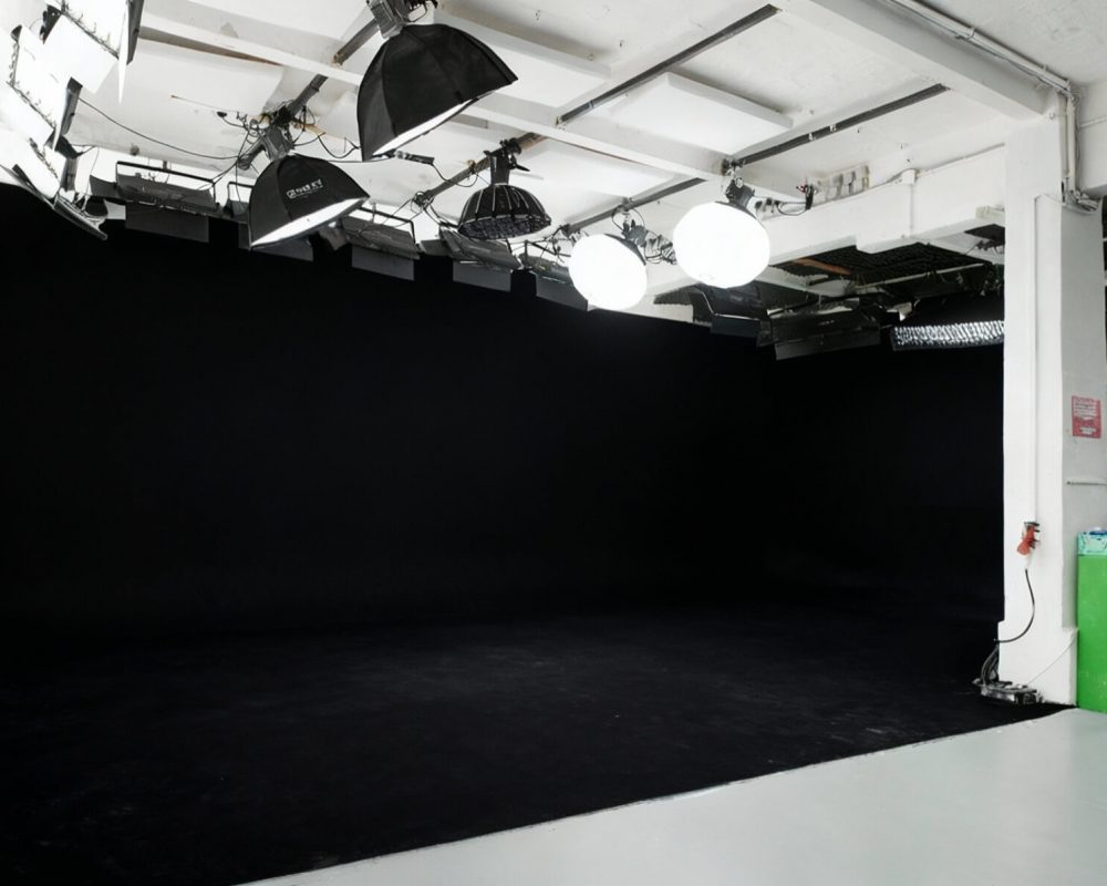 Allmost Studio Berlin Kreuzberg: professional rental studio with black corner cyclorama, lighting and grip equipment, ideal for film, video, photo and AI productions.